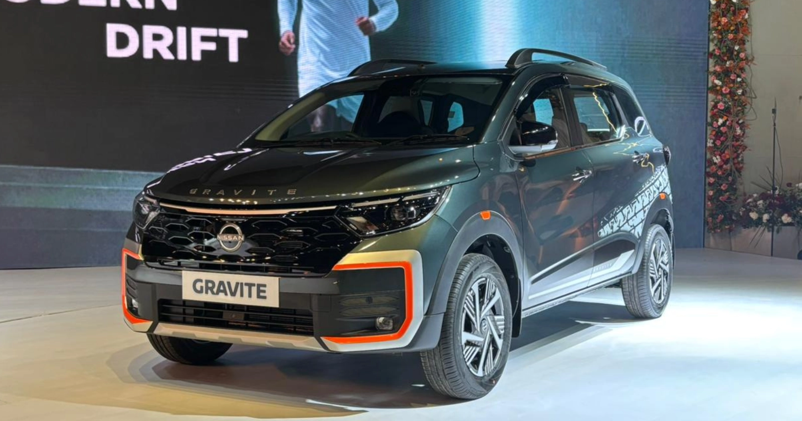 Nissan Gravite Launched in India at Rs 5.65 Lakh Nissan has expanded its India portfolio with the launch of the Gravite, a compact 7-seater MPV priced from Rs 5.65 lakh to Rs 8.93 lakh (ex-showroom). The introductory price applies to the first 5,000 bookings, positioning the Gravite aggressively in the entry MPV space. While the launch happened yesterday, the Gravite’s importance lies beyond the announcement headline. Its pricing strategy, long-term warranty options and urban-friendly configuration make it a serious consideration for families evaluating practical mobility under Rs 10 lakh. Prices and Variant Strategy The Gravite is offered in five trims: Visia, Acenta, N-Connecta, Tekna and a limited Launch Edition. Manual transmission is standard, while the AMT option is available from the N-Connecta trim onwards. Visia – Rs 5.65 lakh Acenta – Rs 6.59 lakh N-Connecta – Rs 7.20 lakh (MT) / Rs 7.80 lakh (AMT) Tekna – Rs 7.91 lakh (MT) / Rs 8.49 lakh (AMT) Launch Edition – Rs 8.35 lakh (MT) / Rs 8.93 lakh (AMT) The structure is straightforward. The lower trims focus on accessibility, while N-Connecta begins to feel properly equipped for urban use. Tekna adds convenience and comfort features that make daily ownership easier, especially for city families. For most buyers, the N-Connecta — particularly with the AMT — is likely to strike the right balance between affordability and features. Warranty and Ownership Edge A key differentiator is the warranty package. The Gravite comes with a standard 3-year/1,00,000km coverage, extendable up to 10 years/2,00,000km — one of the most reassuring packages in its segment. The first 5,000 customers also receive five years of zero service cost benefits along with finance and upgrade offers. For long-term buyers, this significantly reduces ownership uncertainty and strengthens the Gravite’s value equation. In a segment driven by cost-conscious decisions, warranty clarity matters as much as sticker price. Design: Familiar Architecture, Distinct Identity The Gravite shares its CMF-A+ platform roots with the Renault Triber, but Nissan has made deliberate cosmetic changes to give it a separate identity. The front fascia features a honeycomb grille, redesigned bumper with C-shaped silver inserts and a distinct LED DRL signature. ‘GRAVITE’ lettering on the bonnet and tailgate adds presence, while unique alloy wheels further separate it visually. Colour options include Forest Green, Onyx Black, Blade Silver, Snow White and Metallic Grey. A limited-run Launch Edition, restricted to 1,001 units, adds orange exterior accents and white tyre lettering decals for buyers seeking a slightly more expressive look. The differentiation is evolutionary rather than radical, but enough to give the Gravite its own showroom personality. Interior Practicality and Features Inside, the Gravite retains the 5+2 seating configuration that defines its practicality. The third row remains removable, allowing buyers to switch between passenger space and luggage capacity depending on usage. The dashboard layout is clean and functional, prioritising usability over visual drama. Higher variants bring an 8-inch touchscreen infotainment system paired with a 7-inch digital driver display. Wireless Apple CarPlay and Android Auto, push-button start, cruise control, automatic climate control and rear AC vents enhance everyday convenience. Safety has not been overlooked, with six airbags offered — an important reassurance for family buyers in this price bracket. The Launch Edition builds on this with a JBL audio system, dual-channel dashcam, ambient lighting and a cabin air purifier. These additions elevate perceived value but do not alter the core mechanical offering. Engine and Real-World Expectation Under the hood, the Gravite uses a 1.0-litre three-cylinder naturally aspirated petrol engine producing 72hp and 96Nm. It is paired with either a 5-speed manual or a 5-speed AMT. Nissan claims fuel efficiency of 19.3kpl for the manual and 19.6kpl for the AMT. Performance expectations should be realistic. This engine is tuned for efficiency and urban commuting rather than highway aggression. For city-based families prioritising mileage and manageable running costs, it fits the brief. A dealer-fit dual-cylinder CNG kit is expected soon, further strengthening its cost-of-ownership appeal for high-mileage users. Who Should Consider the Nissan Gravite? The Gravite makes the most sense for buyers who: Need occasional third-row flexibility Prioritise low upfront cost Value extended warranty assurance Prefer compact dimensions for city driving It is not positioned as a performance-oriented MPV. Instead, it is a rational, space-efficient solution aimed at first-time 7-seater buyers or growing urban families. The Bigger Picture The launch may be a day old, but the Gravite’s relevance is just beginning. In India’s price-sensitive MPV space, clarity of pricing, warranty depth and practical packaging matter more than launch-day excitement. With its introductory pricing, extended warranty option and balanced variant structure, the Nissan Gravite enters the market as a calculated value play rather than a headline-grabbing disruptor. For buyers evaluating 7-seaters under Rs 9 lakh, this is one model that deserves careful consideration — particularly in its mid-spec trims where price and features intersect intelligently. Nissan Gravite Launched at 5.65 lakhs- details -features on Carbae - the new car buying platform